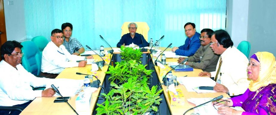 Sheikh Aminuddin Ahmed, Chairman of Bangladesh House Building Finance Corporation, presiding over its 449th Board Meeting at its Head Quarters in the city on Wednesday. Debasish Chakrabarty, Managing Director, Sudhangshu Shekhor Biswas, Md. Akter-uz-Zaman