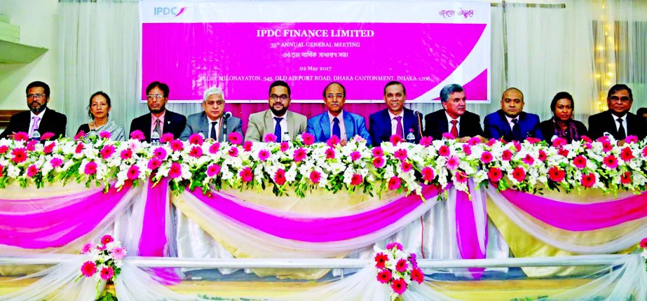 Dr Muhammad Musa, Chairperson of IPDC Finance Limited, presiding over its 35th AGM at a city auditorium recently. The AGM declared 20pc stock dividend for the year 2016 for its shareholders. Mominul Islam, Managing Director of the company, representative