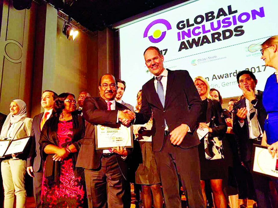 Bangladesh Bank Deputy Governor SK Sur Chowdhury receiving the â€˜Global Money Week Awardâ€™ at a ceremony in Berlin, Germany.