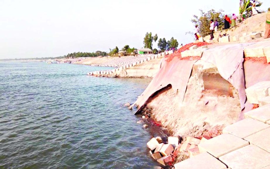 120 meters of the flood control dam of Jamuna River at Bahuk-Tutul intersection collapsed on Wednesday night, creating panic among the people.