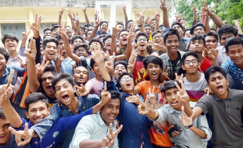 Students of Chittagong Muslim High School rejoicing after announcement of SSC results on Thursday.