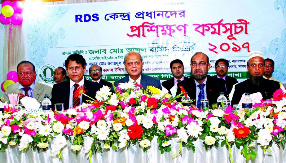 Abdul Hamid Miah, Managing Director of Islami Bank Bangladesh Limited, presiding over the training programme of Rural Development Scheme under Narayangonj Branch on Wednesday. Md Obaidul Haque, Head of Rural Development Division, Dr Kamal Uddin Jasim, SVP