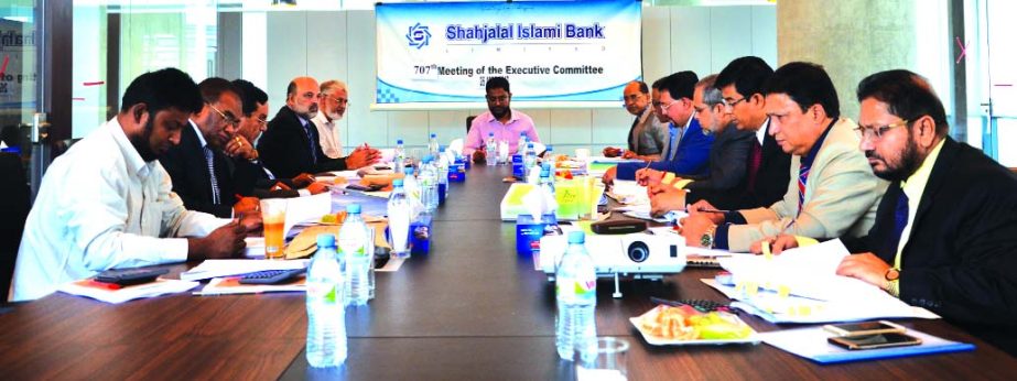 Md Sanaullah Shahid, EC Chairman of Shahjalal Islami Bank Limited, presiding over its 707th meeting at its head office in the city recently. Farman R Chowdhury, Managing Director, Fakir Akhtaruzzaman, Vice-Chairman, Anwer Hossain Khan, Mohammed Younus and