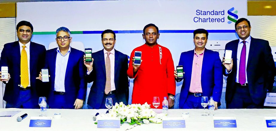 Standard Chartered Bangladesh brings two new smart phone apps, 'SC Mobile Bangladesh' and the 'Good Life'. Mahtab Uddin Ahmed, CEO of Robi Axiata Limited, Yasir Azman, Acting CEO of Grameenphone and Taimur Rahman, Chief Corporate and Regulatory Affair