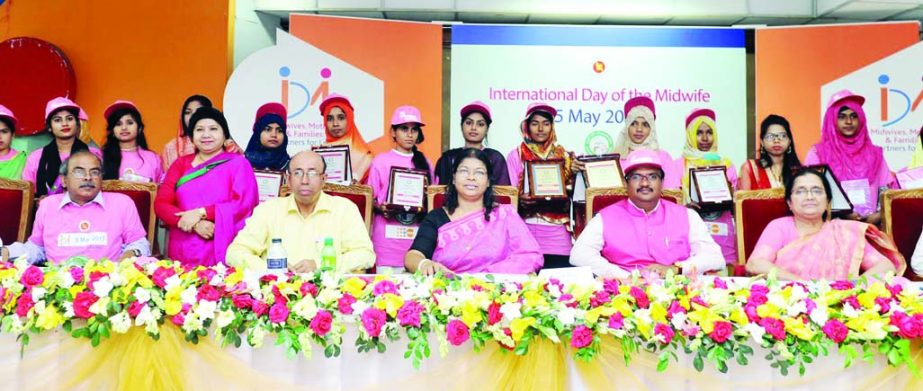 Additional Secretary of Health and Family Welfare Ministry Sardar Abul Kalam, among others, at a ceremony organised on the occasion of International Midwife Day at the Institute of Diploma Engineers, Bangladesh in the city on Friday.