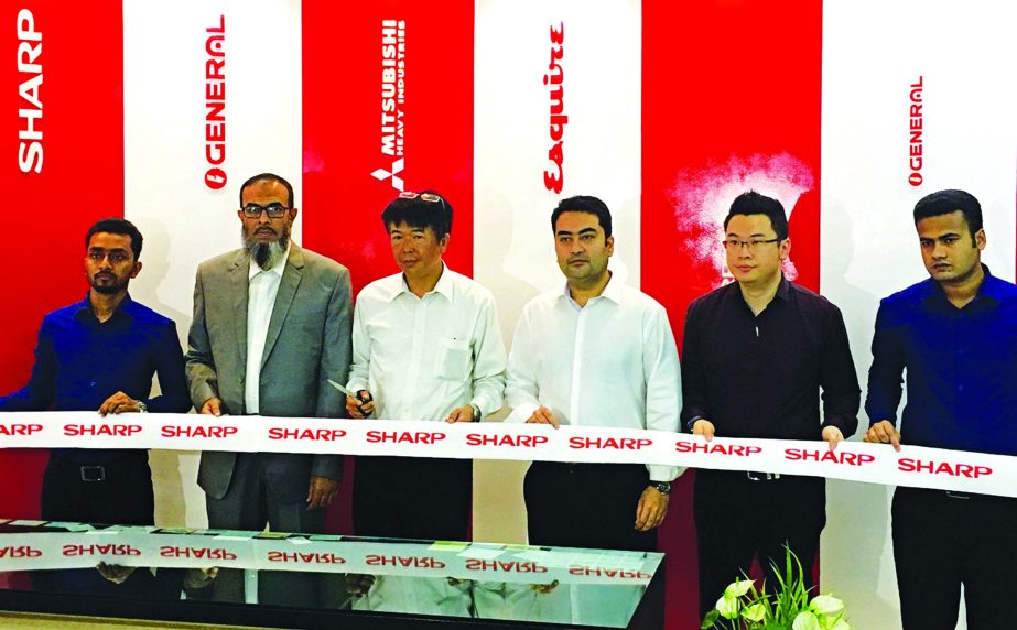 Tadashi Ohyama, Managing Director of Sharp-Roxy Sales & Service Company, opening 10 new showrooms of Esquire Electronics Ltd at different place in the city recently. Arifur Rahman, Managing Director of Esquire Electronics Ltd, was also present.