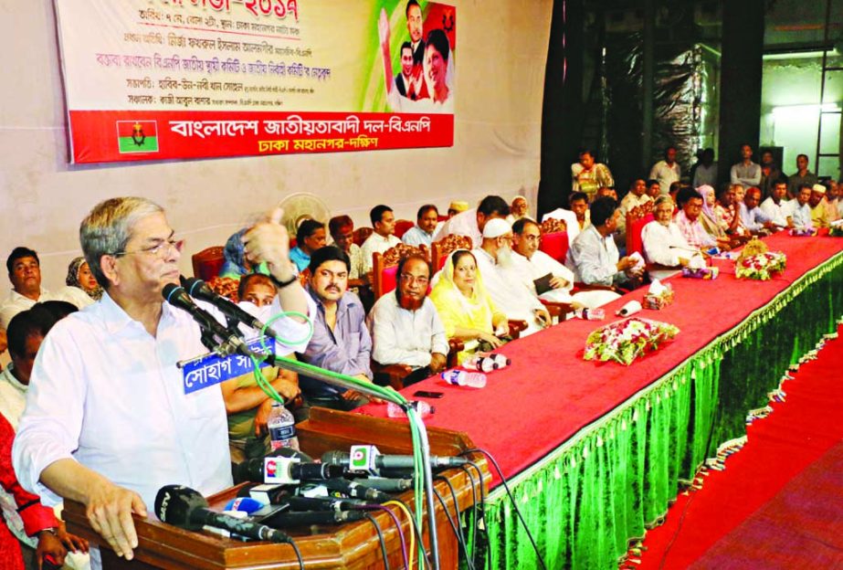 BNP Secretary General Mirza Fakhrul Islam Alamgir speaking at the party's workers' conference at Mahanagar Natyamancha in the city on Sunday.
