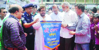 BARISAL: Cultural Affairs Minister Asaduzzaman Noor inaugurating week-long Book Fair at Barisal Zilla School ground on Sunday.