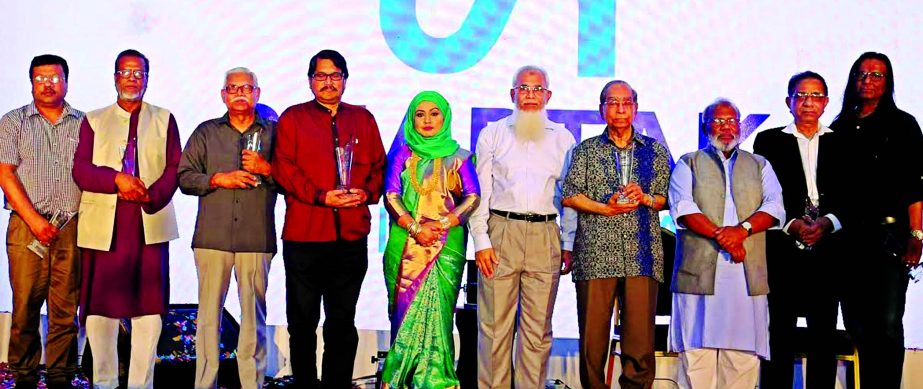 Prime Minister's Adviser HT Imam, poses with the participants of 20th Anniversary programme of Shaptak Grihayan Limited at a city auditorium recently. M Moshiur Rahman, Managing Director and Major General (Rtd.) Engr. Abdul Matin, EC Chairman of the comp