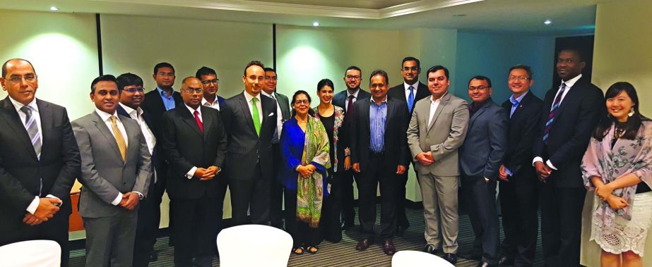 Sheikh Mohammad Maroof, DMD and Head of Wholesale Banking of City Bank Ltd, poses with Ayesha Aziz Khan, Managing Director, Summit Power International Pte. Limited; Anjuman Aziz Khan, Director, Summit Group; Abdul Wadud, Managing Director, Summit Power Li