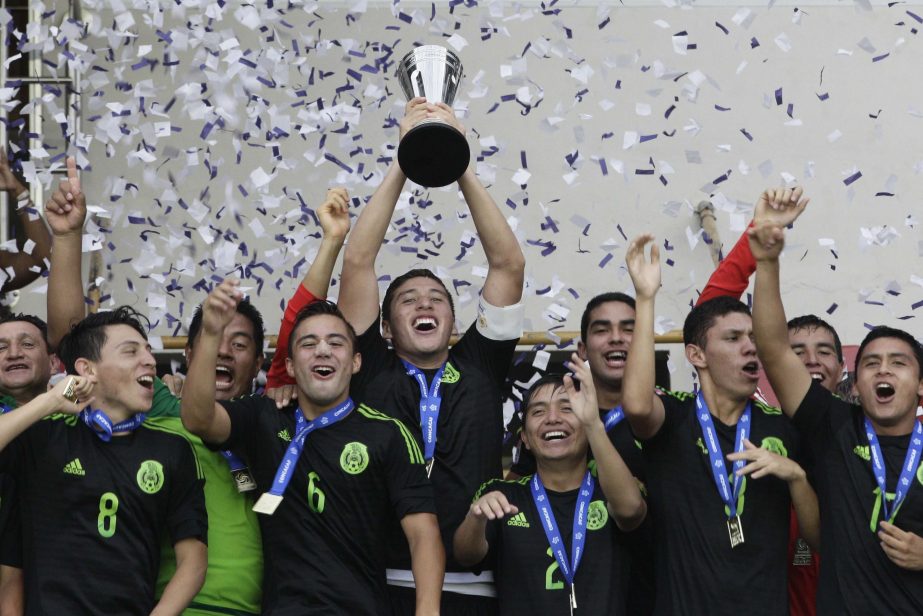 Mexico's soccer players celebrate after defeating the U.S. in a penalty shootout in the Concacaf under-17 soccer championship final in Panama City on Sunday.