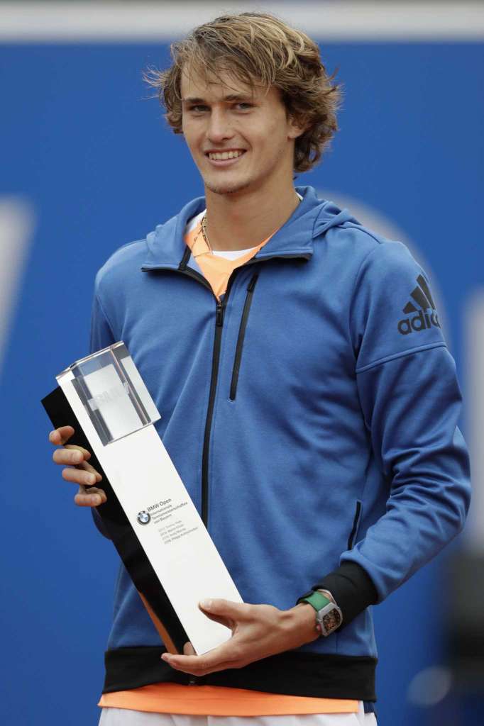 Alexander Zverev of Germany holds the trophy after winning his final match against Guido Pella of Argentina at the ATP tennis tournament in Munich, Germany on Sunday.