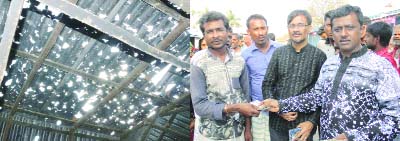 BHALUKA (Mymensingh): Rafiqual Islam, renowned social worker distributing cash money among the poor people at Kashab Village as their houses were damaged by nor'wester recently.