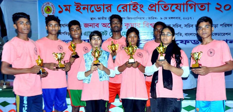 The winners of the 1st Indoor Rowing Competition pose for a photo session at the gymnasium of National Sports Council on Tuesday.