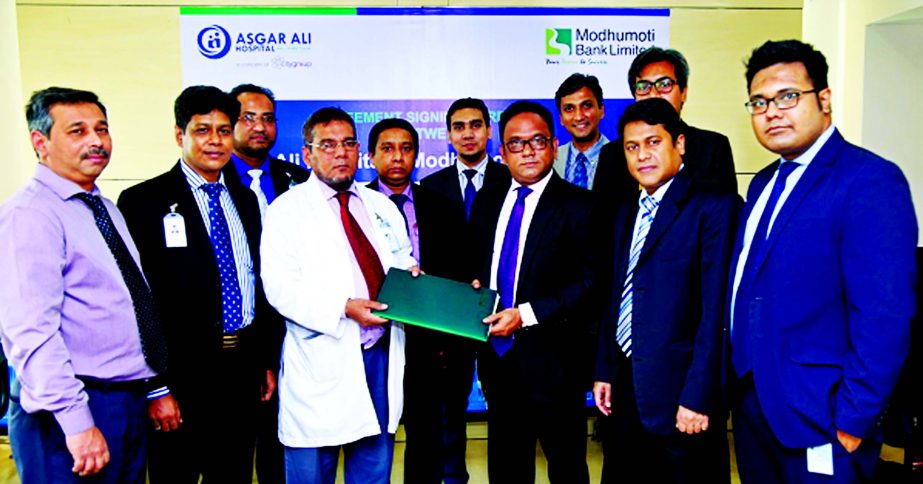 Md. Shaheen Howlader, Head of SME & Retail Banking Division of Modhumoti Bank Limited and Prof. Dr. Zabrul SM Haque, CEO & Director - Medical Services of Asgar Ali Hospital signed an agreement for offering discount facilities to Debit & Credit Card holder