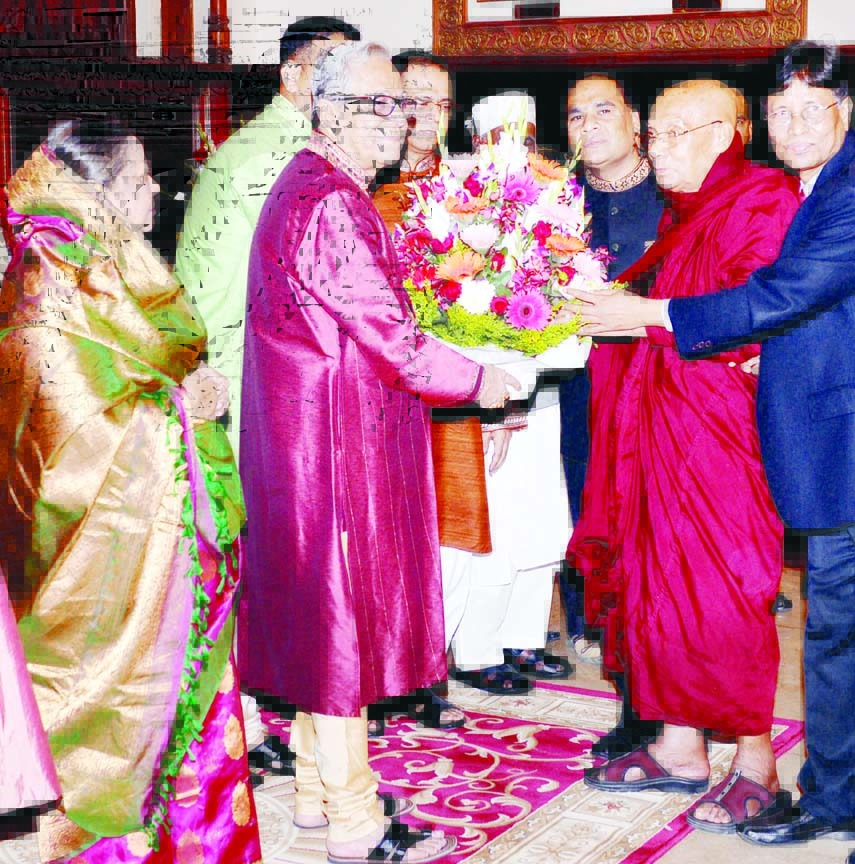 President Md. Abdul Hamid exchanging greetings with the Buddhist community at Bangabhaban on the occasion of Buddha Purnima, the biggest religious festival of the Buddhists yesterday afternoon.