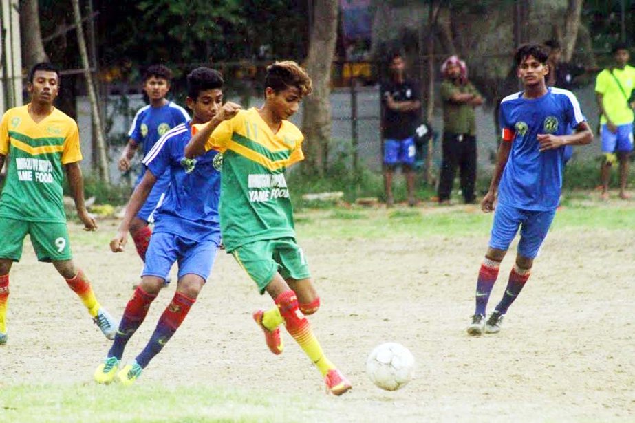 An action from the match of the Dhaka North City Corporation and Dhaka South City Corporation Pioneer Football League between Elias Ahmed Chowdhury Smrity Sangsad and RND Krira Chakra at the Paltan Maidan on Wednesday.