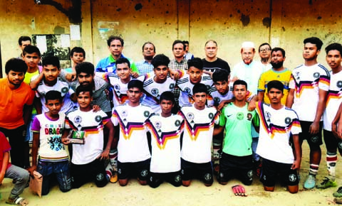 Members of Monsur Sporting Club pose for a photo session after defeating J Sports Academy by 4-0 goals in their match of the Dhaka North City Corporation and Dhaka South City Corporation Pioneer Football League at East End Club Ground on Tuesday. Bappi of