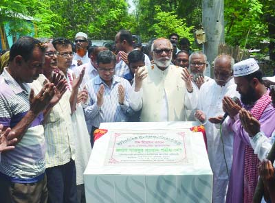 PABNA: Land Minister Shamsur Rahman Sharif MP laying the foundation stone of Bilkader Govt Primary School in Ishwardi yesterday.