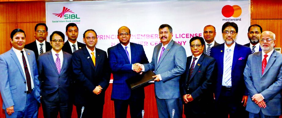 Shahid Hossain, Managing Director of Social Islami Bank Limited and Syed Mohammad Kamal, Country Manager of MasterCard, inks a deal to offer customers maximum utility from card products and services at the bank's head office recently.