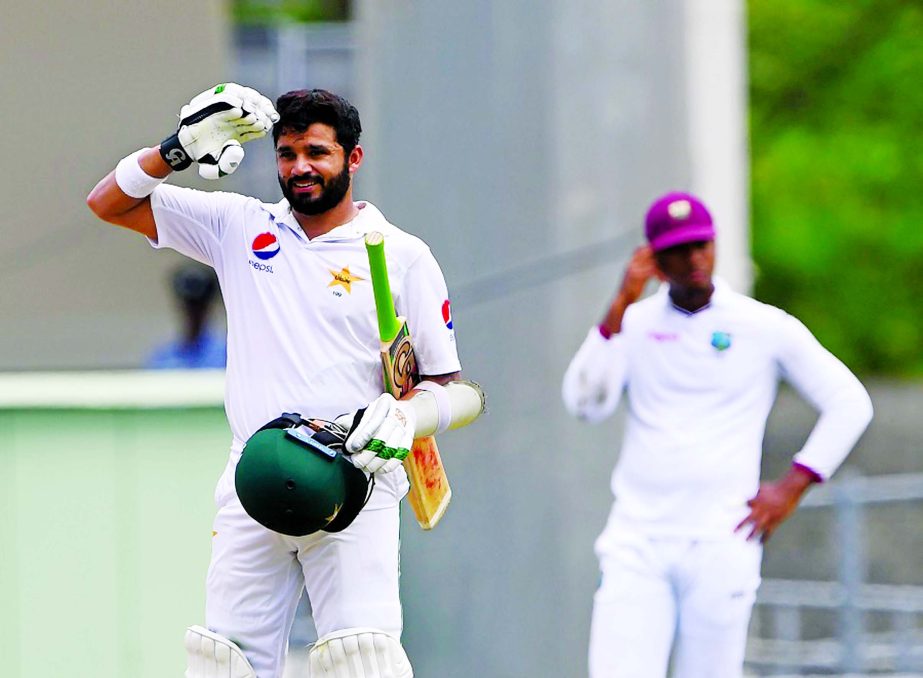 Azhar Ali does the salute again on the 2nd day of the 3rd Test between West Indies and Pakistan at Roseau on Thursday.