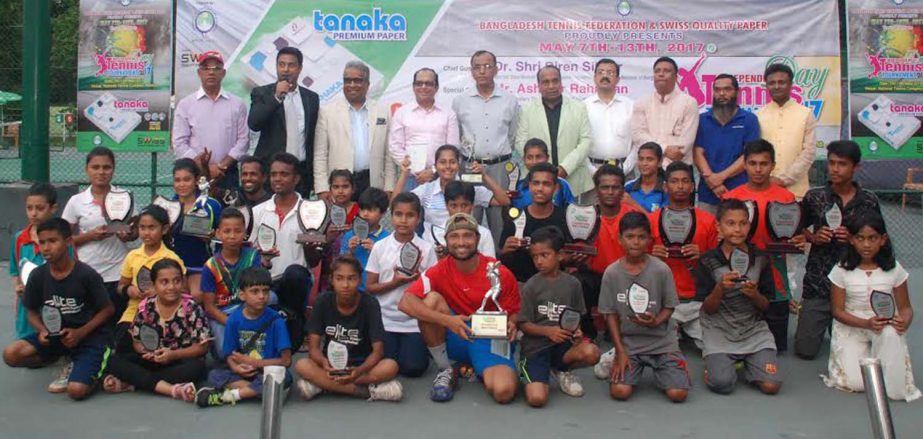The winners of the Swiss Quality Paper Independence Day Tennis Competition with the chief guest State Minister for Youth and Sports Dr Biren Sikder and the other guests and officials of Bangladesh Tennis Federation pose for a photo session at the National