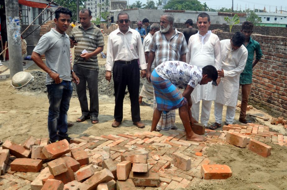 Councillor Md Saifuddin Khaled visiting repairing work of road of Chandargaon Ward on Saturday.