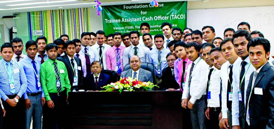 Syed Waseque Md. Ali, Managing Director of First Security Islami Bank Ltd, poses with the participants of the 23rd Foundation Course at FSIBL Training Institute on Sunday.