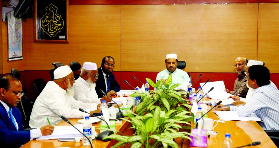 Hafez Md. Enayet Ullah, Chairman of the Executive Committee of the Board of Directors of Al-Arafah Islami Bank Limited, presiding over its 580th meeting at the bank's head office on Sunday. Md. Habibur Rahman, Managing Director of the bank was also pres