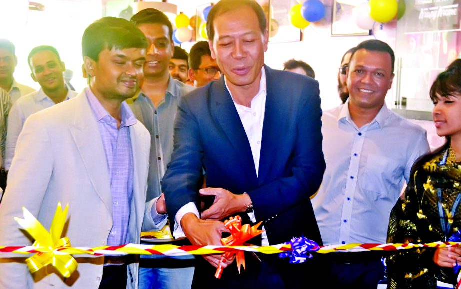 Salman Obaidul Karim, Managing Director of Orion Group, inaugurating a Singapore-based chain restaurant "Fish & Co" at Nilu Square, Dhanmondi in the city on Sunday. Dery lao, Consul of Singapore embassy was also present.
