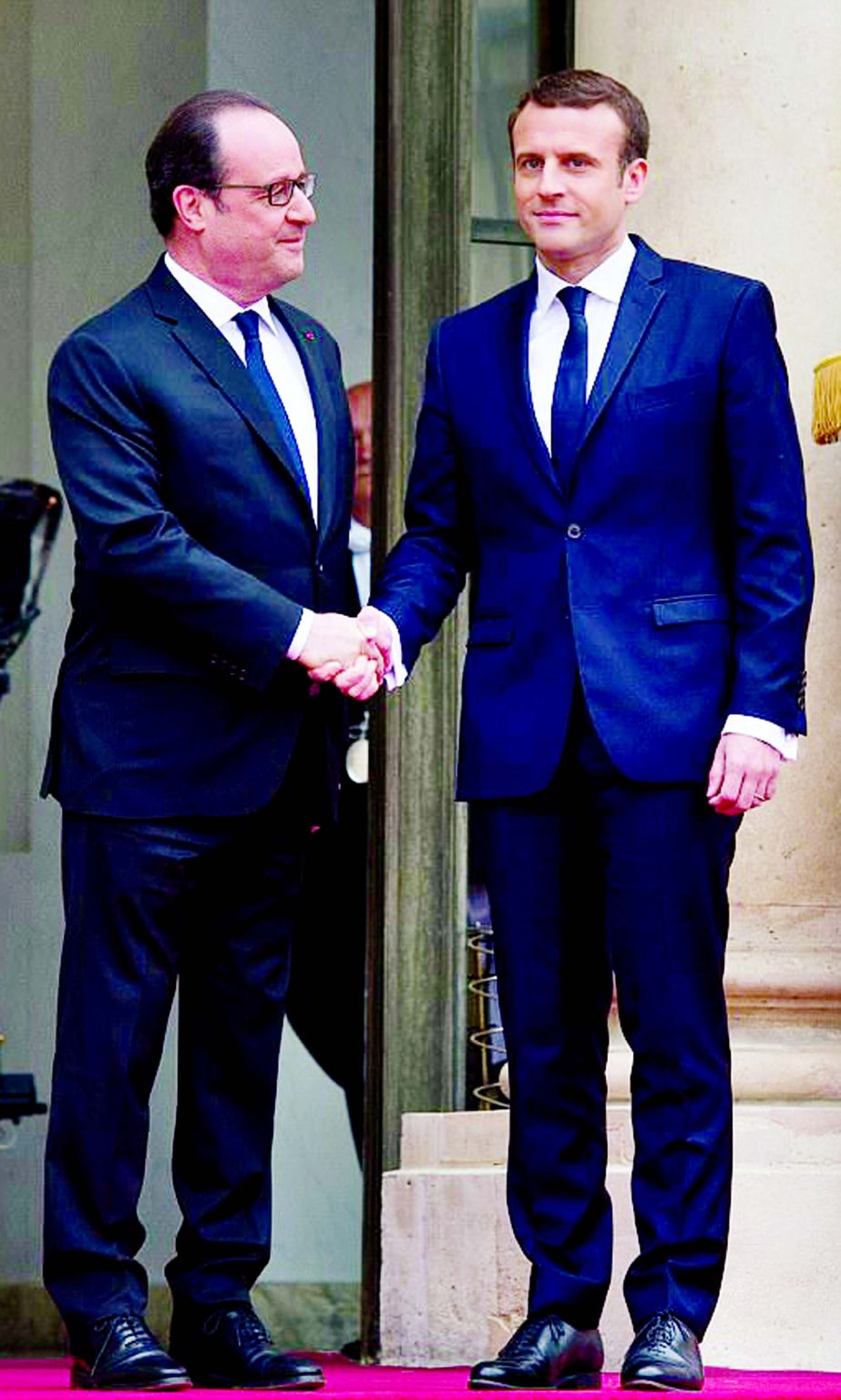 The centrist leader Macron, 39, posed for photos on the front porch with outgoing president Francois Hollande at Elysee Palace in Paris on Sunday.