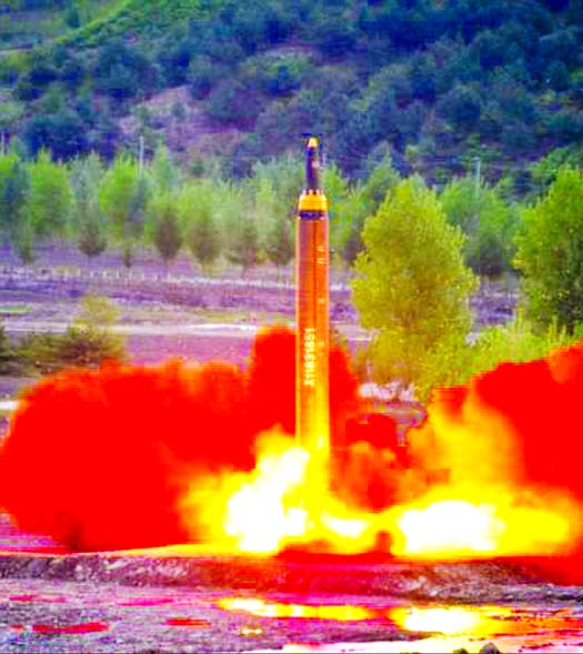 The long-range strategic ballistic rocket Hwasong-12 (Mars-12) is launched during a test in this undated photo released by North Korea's Korean Central News Agency (KCNA).