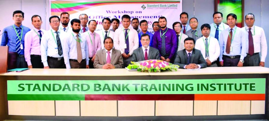 Md. Motaleb Hossain, Managing Director (Current Charge) of Standard Bank Limited, inaugurating a 2-day long workshop on "Office Management" organized by the Training Institute of the bank recently. Mohammad Zakaria, Principal and Md. Amzad Hossain Fakir