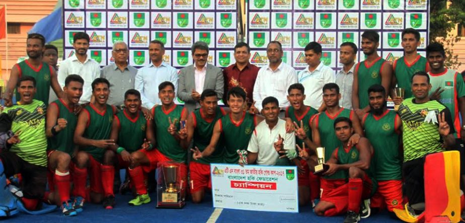 Bangladesh Army, the champions of the 31st ATN Bangla National Hockey Gold Cup Tournament with the chief guest State Minister for Foreign Affairs Md Shahriar Alam and the other guests and officials of Bangladesh Hockey Federation pose for a photo session