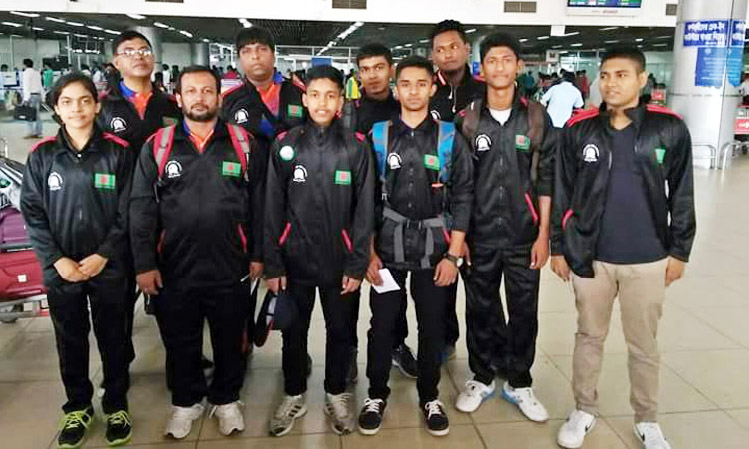 The Colombo-bound Bangladesh Junior and Cadet Table Tennis teams pose for photograph in the city on Thursday.