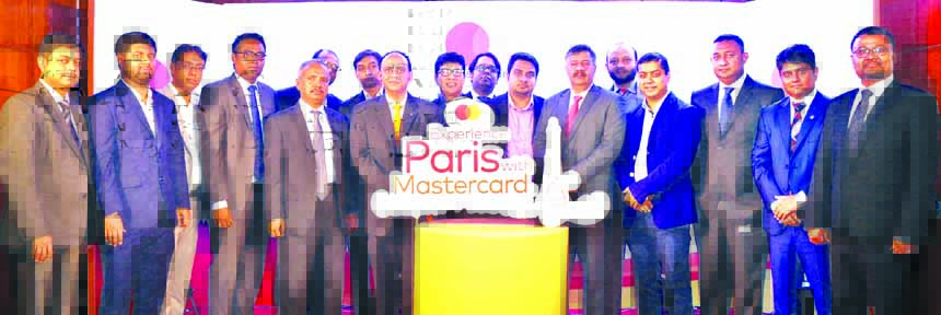 Syed Mohammad Kamal, Country Manager of Mastercard Bangladesh, launching the 'Experience Paris with Mastercard' campaign programme at a hotel in the city on Thursday.