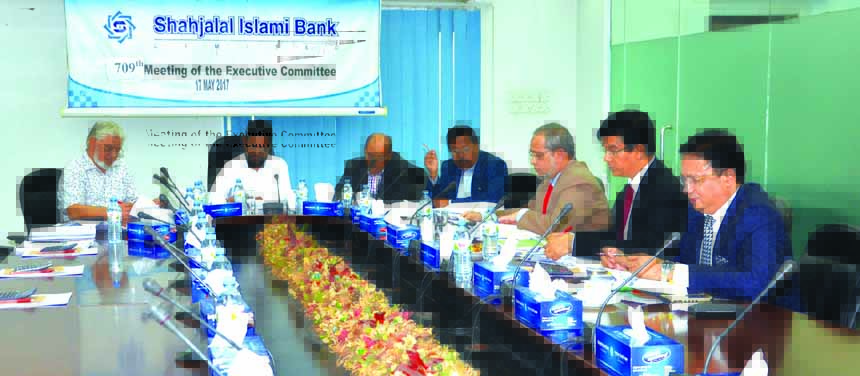 Md Sanaullah Shahid, EC Chairman of Shahjalal Islami Bank Limited, presiding over the 709th meeting at its head office recently. Engineer Md Towhidur Rahman, Chairman, Board of Directors, Mohiuddin Ahmed, Vice-Chairman, Md Shahjahan Shiraj, Managing Direc
