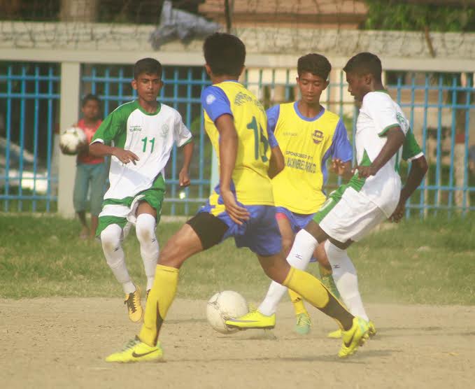 A scene from the match of the Dhaka North City Corporation and Dhaka South City Corporation Pioneer Football League between Wazed Miah Krira Chakra and Alhaj Nur Islam Football Academy at the Paltan Maidan on Friday. Wazed Miah Krira Chakra won the match