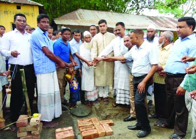 GANGACHARA (Rangpur): Asaduzzaman Bablu, Chairman, Gangachara Upazila laying down foundation stone of Shaheed Minar of Borobill Dee-Mukhi High School in Gangachara Upazila recently.