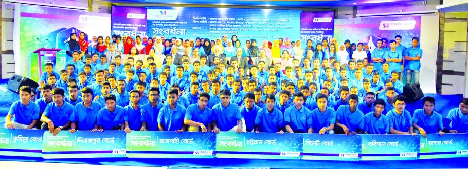 Alamgir Kabir, FCA, Chairman of Southeast Bank Limited, poses with the participants of a reception programme at the Officers' Club in Dhaka recently. The bank's foundation organized the function for the Higher Secondary meritorious students coming from