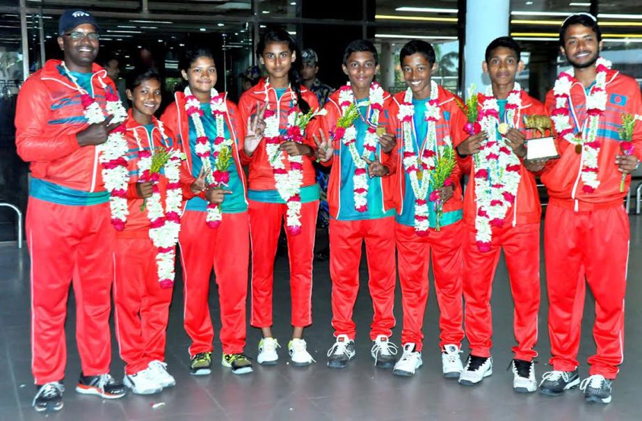 Members of Bangladesh Under-12 Tennis team pose for a photo session at the Hazrat Shahjalal International Airport on Saturday. Bangladesh Boys' Under-12 Tennis team emerged as the champions of the ITF Asian Under-12 team event tennis competition held at