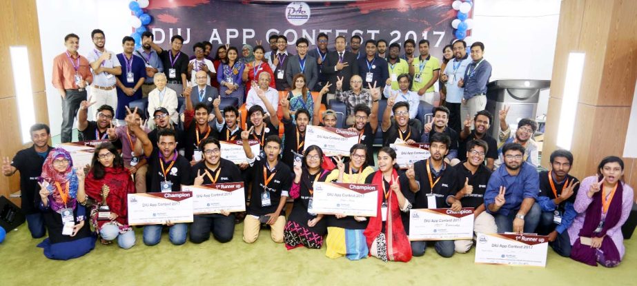 Distinguished guests along with the winners of DIU Apps Contest 2017 pose for a photo session at the closing and prize giving ceremony of the contest held on Saturday at Auditorium 71 of Daffodil International University.