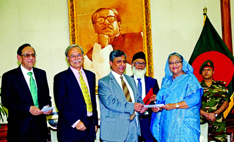 Zahur Ullah, Executive Committee Chairman of ONE Bank Limited, handing over a cheque of Tk 2 crore to Prime Minister Sheikh Hasina as a donation to the 'Prime Minister's Education Assistance Trust Fund' at latter's office recently. Bank's Vice Chair