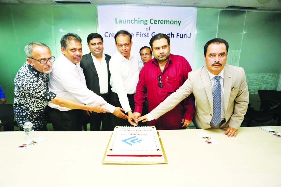 Hasan Ahmed, Director of Credence Asset Management Ltd and Chairman of Popular Life Insurance Co. Ltd, inaugurating 'Credence First Growth Fund' at a city hotel recently. Md Shakil Rizvi, Former President of Dhaka Stock Exchange and Md Zakir Hossain, Ma