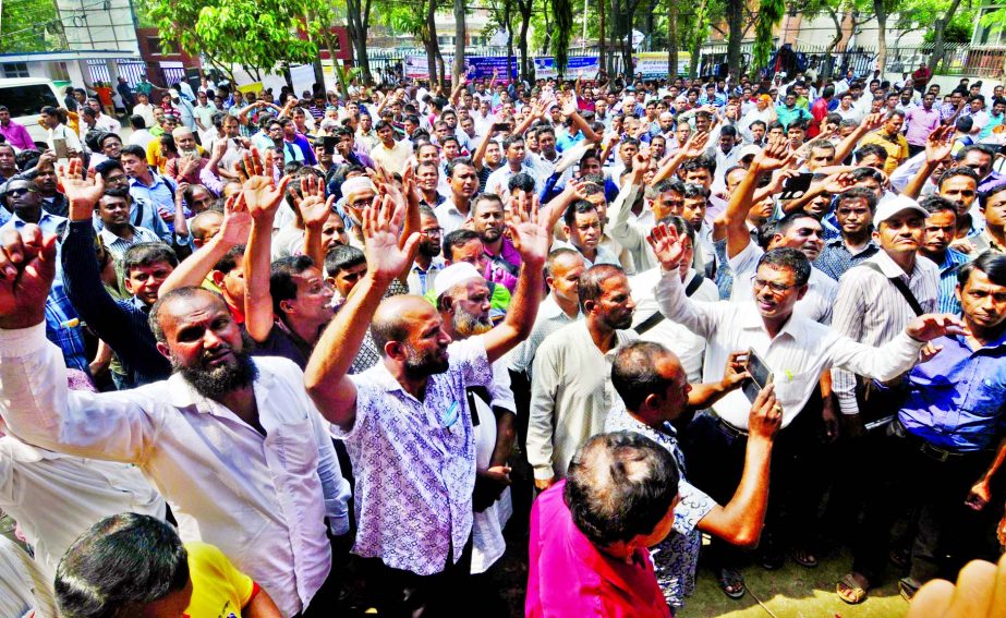 AI Technicians Kalyan Samity leaders and workers of Bangladesh Animal Resources staged demonstration in front of Animal Resources Directorate in city's Farmgate for implementing their 4- point demand aimed to absorb them permanently. This photo was taken