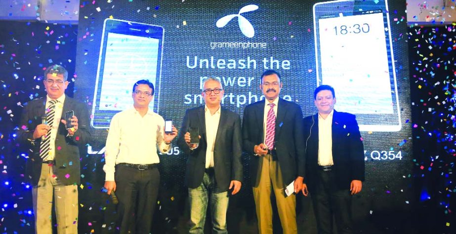 Dr. Shahjahan Mahood, Chairman, BTRC, inaugurating two smart phones of Cobranded Micromax Q354 and Cobranded Lava Iris 505 with Grameenphone at the GP House in the city on Sunday. Yasir Azman, CMO, GP, Sameer Kakar, Vice-President of Micromax and Md Zoho