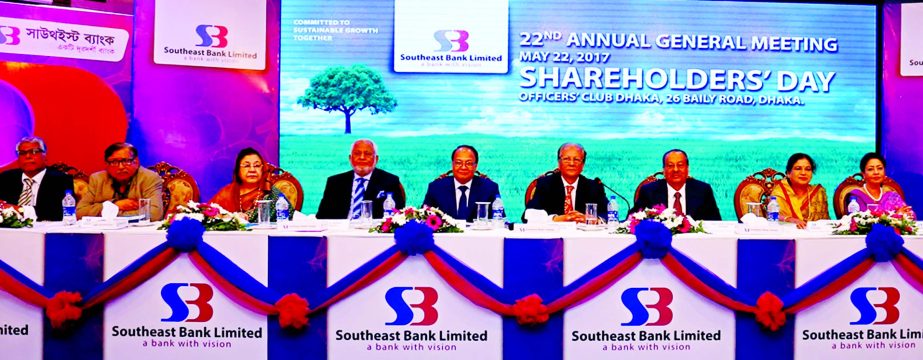 Alamgir Kabir, FCA, Chairman of Southeast Bank Limited, presiding over the 8th Extra-Ordinary General Meeting and 22nd AGM at the bank head office in the city on Monday. M Kamal Hossain, Managing Director (CC), Directors and a large number of Shareholders