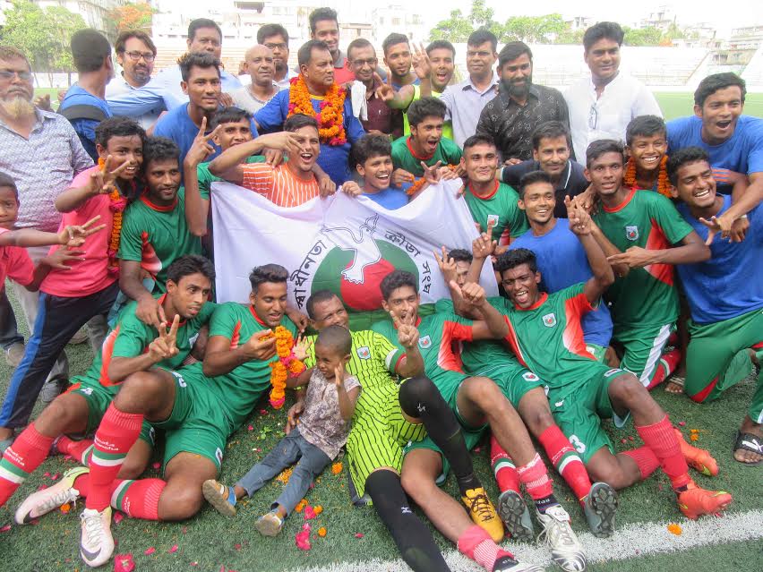 Members of Swadhinata Krira Sangha celebrate victory at the Bir Sreshtha Shaheed Sepoy Muhammad Mustafa Kamal Stadium in Kamalapur on Monday.