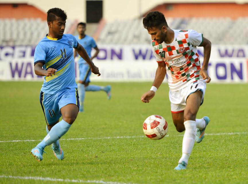 An action from the Federation Cup Football Tournament between Dhaka Abahani Limited and Muktijoddha Sangsad KC at the Bangabandhu National Stadium here on Monday.