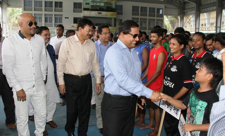 State Minister for Textile and Jute Mirza Azam being introduced with the participants of the Sheikh Russel 12th National Wushu Championship as the chief guest at the Sheikh Russel Roller Skating Complex on Tuesday.